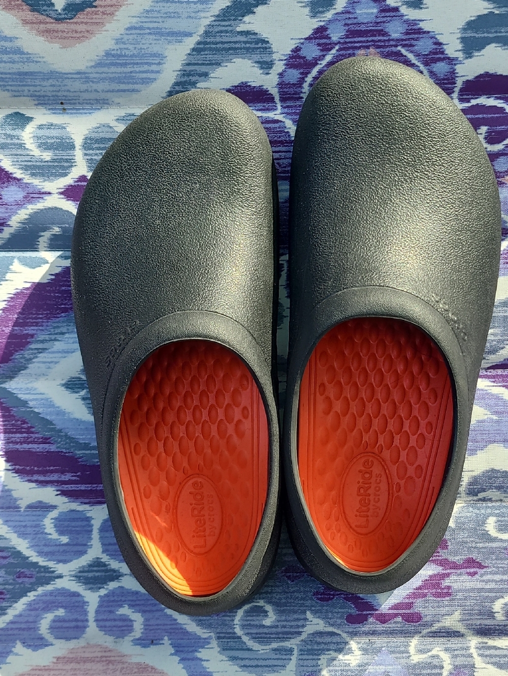 CROCS Slip-On Clogs in Black with Orange Insole